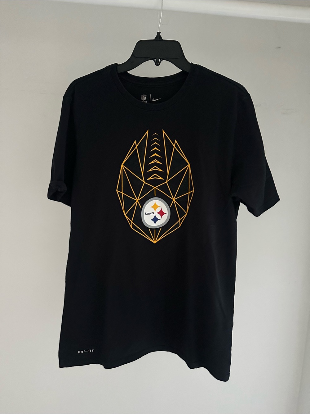 Nike Men’s Black Graphic Short Sleeve Tee with Gold Geometric Design